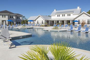 Resort style pool with tanning ledge
